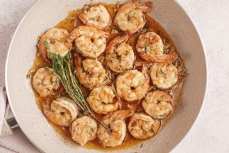 Shrimp dish cooked, in savory sauce. with fragrant herbs, and spices