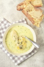 Chikhirtma chicken soup, Georgian dish, with lavash, top view, no people