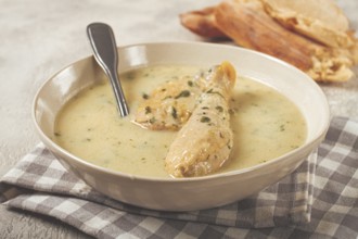Chikhirtma chicken soup, Georgian dish, with lavash, top view, no people