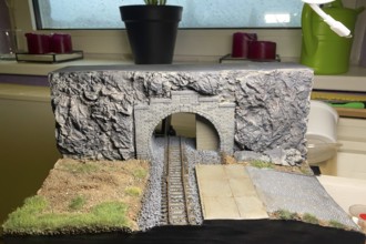 Model making diorama: railway tunnel with tracks and rocky landscape, Haan, North Rhine-Westphalia,