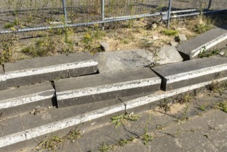 Concrete barricades with white stripes on pavement, Manheim, North Rhine-Westphalia, Germany