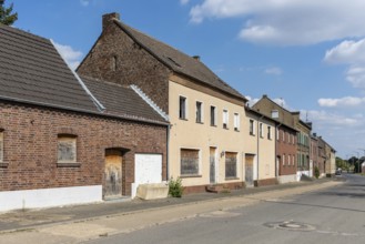 Abandoned residential buildings with wooden sheds in Manheim, North Rhine-Westphalia