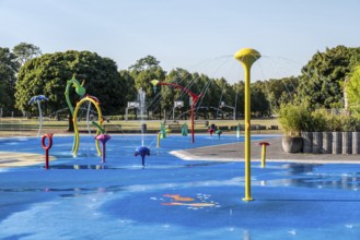 Water playground with colourful fountains, green belt, Cologne, North Rhine-Westphalia, Germany