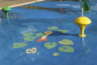 Yellow water play equipment with water lily motif