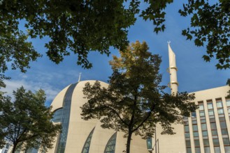 Mosque Cologne with minaret and trees