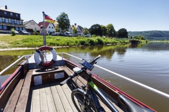 E-bike on yaw rope ferry, passenger ferry on the Weser, from Herstelle to Würgassen, Beverungen,
