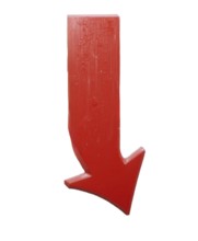 A glossy red arrow pointing downwards, isolated on a white background. The arrow's design is