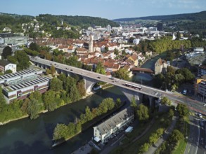View of the town with the high bridge in front, the old town and the covered wooden bridge with the