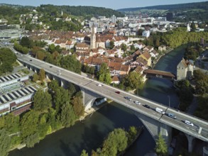 View of the old town, in front the high bridge, behind the covered wooden bridge with the
