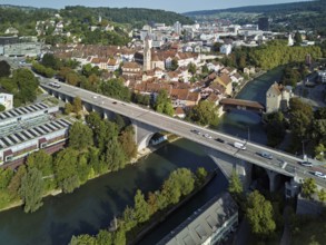 View of the old town, in front the high bridge, behind the covered wooden bridge with the