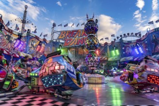 Carousel breakdancing at the Oktoberfest 2024 in Munich, Bavaria, Germany