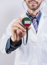 Kuwait health and medical insurance concept. Kuwait healthcare system, doctor holding stethoscope