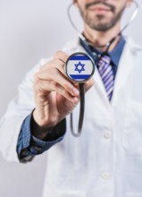 Israel healthcare system, doctor holding stethoscope. Israel health and medical insurance concept