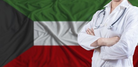 Doctor with crossed arms on Kuwait flag. Kuwait health and care concept. Female doctor on Kuwait