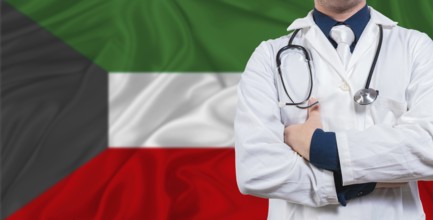 Male doctor with stethoscope on Kuwait flag. Doctor holding stethoscope on Kuwait flag