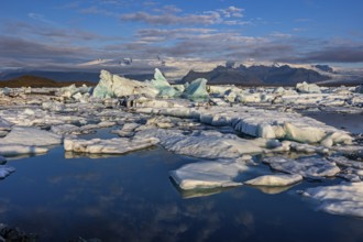 Icebergs, ice floes, lake, glacier lagoon, glacier, mountains, clouds, summer, morning mood,