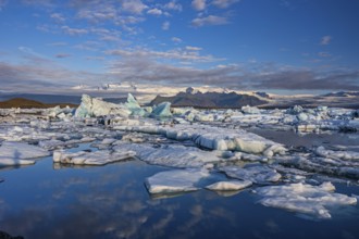 Icebergs, ice floes, lake, glacier lagoon, glacier, mountains, clouds, summer, morning mood,
