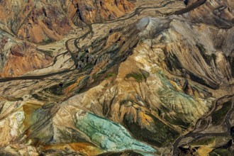Mountain landscape, sunny, summer, river, riverbed, ryolite rock (green), volcanic landscape,