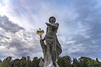 Statue of Hermes or Mercurius in the park of Nymphenburg Palace in Munich, Bavaria, Germany