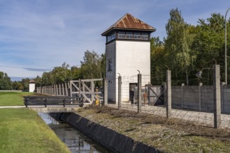 Camp fence and watchtower, Dachau Concentration Camp Memorial, Bavaria, Germany