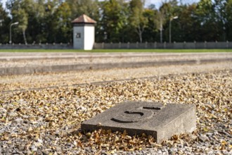 Foundations of the prisoners' barracks and watchtower, Dachau Concentration Camp Memorial, Bavaria,