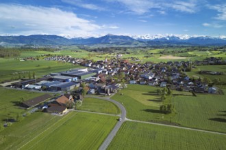 View of the village, in the foreground the industrial area, in the background the Rigi and the
