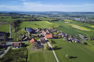 View of the village, in the background the industrial area of Muri, Geltwil, Freiamt, Canton,