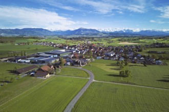 View of the village, in the foreground the industrial area, in the background the Rigi and the