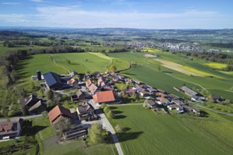 View of the village, in the background the industrial area of Muri, Geltwil, Freiamt, Canton,