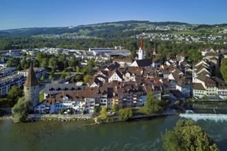 Old town with the Catholic Church of St Nicholas and the witches' tower, in the foreground the weir