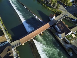Old wooden bridge from above with the weir on the river Reuss, Bremgarten, Freiamt, Canton, Aargau,