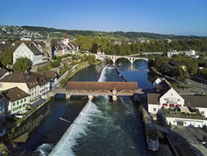 Old town with the tower of the Muri- Amthof, in the foreground the weir and the old wooden bridge
