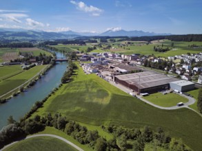 River Reuss, on the right the industrial area, behind the old wooden bridge and the Pilatus, Sins,