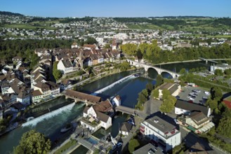 Old town with the tower of the Muri- Amthof, in the foreground the weir, the museum Reusskraftwerk