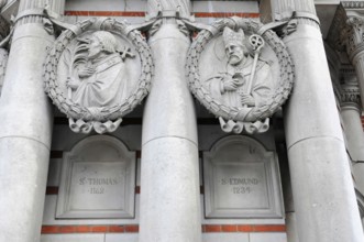 London, England, Great Britain, Europe, Two stone reliefs of historical figures on a Gothic