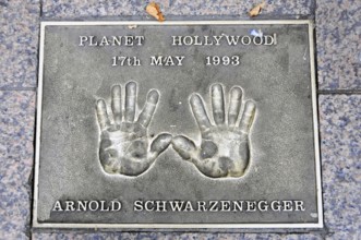 Metal plate with handprints and the inscription of Arnold Schwarzenegger, Planet Hollywood 1993,