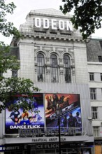 London, England, Great Britain, Europe, Odeon cinema with eye-catching advertising and posters,