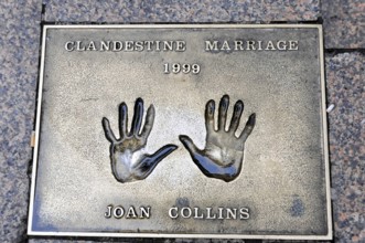 Metal plate with handprints and the inscription of Joan Collins, Clandestine Marriage 1999, London,