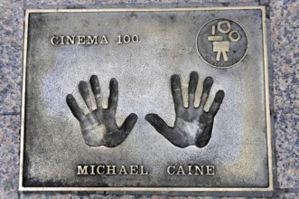 Metal plate with handprints and the inscription of Michael Caine, Cinema 100, London, England,