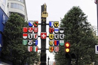 London, England, Great Britain, Europe, City signs with coats of arms and a traffic light in the