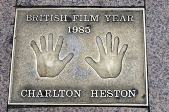 Charlton Heston's handprints for British Film Year 1985 on a metal plate, London, England, Great