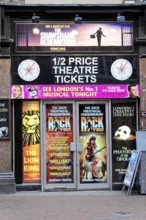 London, England, Great Britain, Europe, Colourful theatre facade in London with posters for current