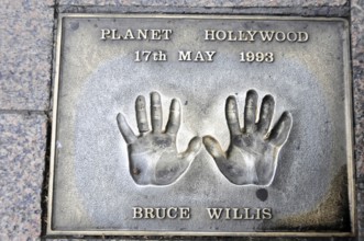 Handprints of Bruce Willis on a pavement slab from 1993, London, England, Great Britain