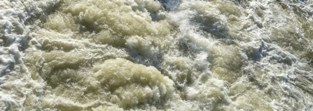 Full frame high angle shot of wild water in sunny ambiance