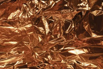 Full frame creased copper foil background
