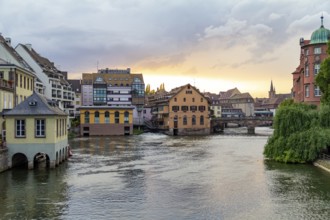 Idyllic waterside impression of Strasbourg, a city at the Alsace region in France at evening time