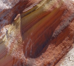 Detail of a a colorful rock formation in the Libyan Desert