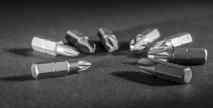 Set of screwdriver bits in dark ambiance