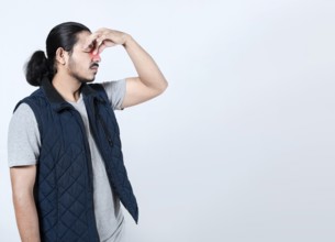 Sore man with sinus pain on isolated