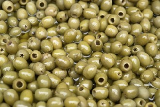 Lots of pickled green olives